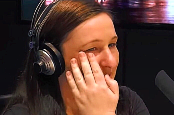 woman on the radio crying