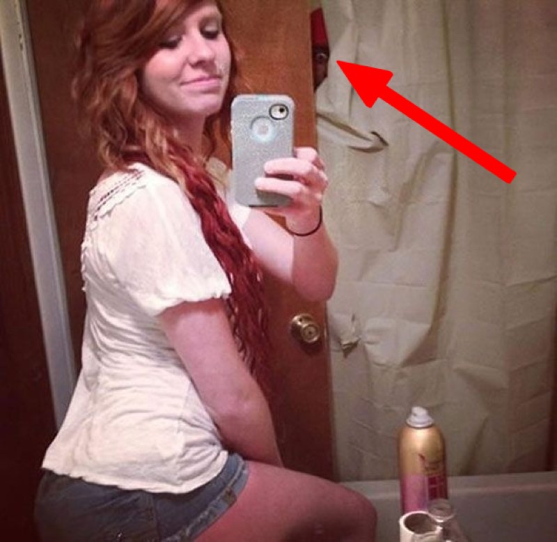 girl taking a selfie in the bathroom